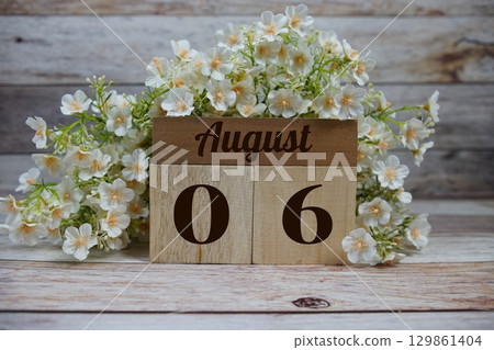 Wooden Calendar Showing the Date of August 6th. Day 6 of August month 129861404
