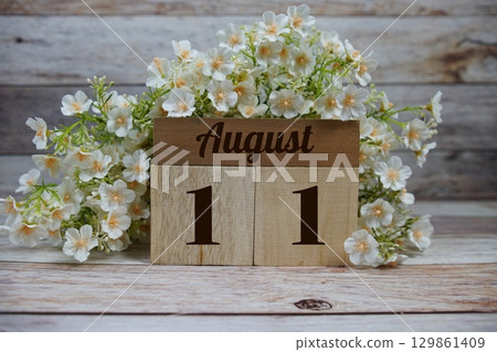 Wooden Calendar Showing the Date of August 11th. Day 11 of August month Wooden Calendar Showing the Date of August 11th. Day 11 of August month 129861409