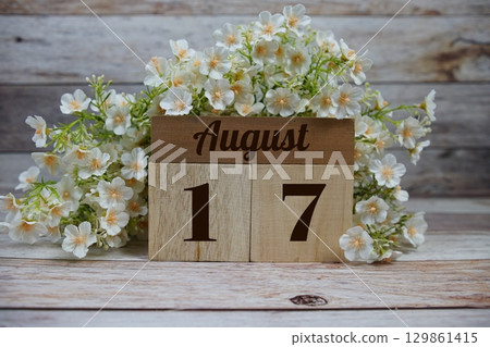 Wooden Calendar Showing the Date of August 17th. Day 17 of August month 129861415
