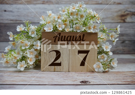 Wooden Calendar Showing the Date of August 27th. Day 27 of August month 129861425