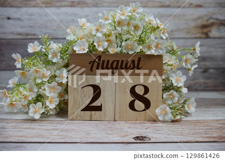 Wooden Calendar Showing the Date of August 28th. Day 28 of August month 129861426