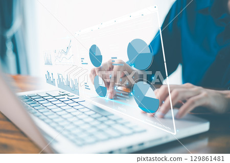Digital age, business on technology, data science and strategy to analyze each datum charts, graphs, reports stored in database, accessed via laptop, enhancing system performance, decision making. 129861481