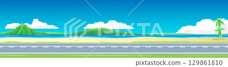 Horizontal view of Asphalt road.  Background of sand beach with island. Side road with coconut trees. Road cutting through the sandy beach. Under the white clouds and blue sky. 129861810