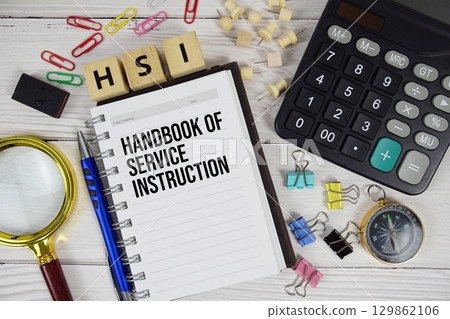 HSI Handbook of Service Instruction acronym on notepad, business and financial concept background 129862106