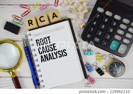 RCA Root Cause Analysis acronym on notepad, business and financial concept background 129862110