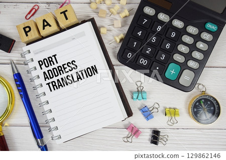 PAT Port Address Translation acronym on notepad, Business concept background 129862146