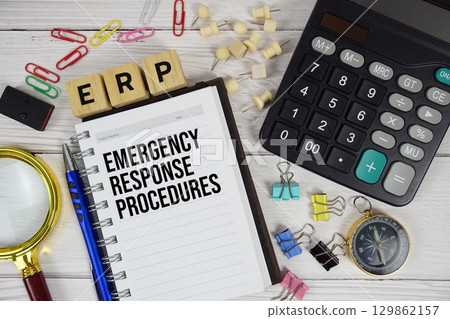 ERP - Emergency Response Procedures acronym on notepad, Business and Financial concept background 129862157