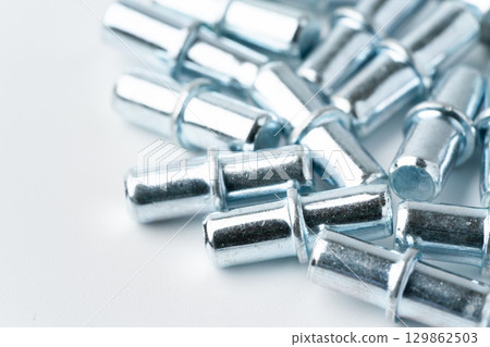 Close-up of iron shelf bracket dowels 129862503
