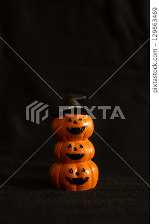 Festive Halloween Pumpkins with Witch Hat Festive Halloween Pumpkins with Witch Hat 129863469