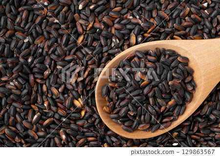 Close-up of black rice on a spoon Close-up of black rice on a spoon 129863567