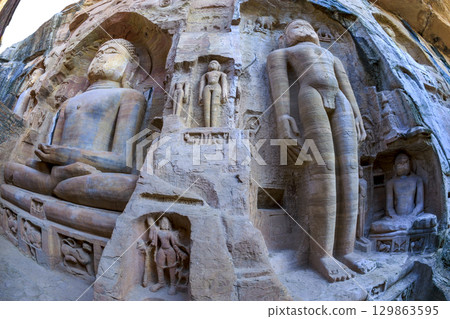 Deity statue in Siddhahar caves of Gwalior Fort Deity statue in Siddhahar caves of Gwalior Fort 129863595