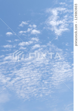 Cirrocumulus clouds in the blue sky 129863603