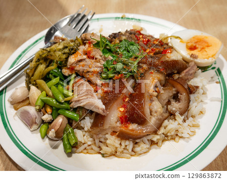 Khao Kha Moo - Thai Stewed Braised Pork Leg with Rice, Served on Plate Khao Kha Moo - Thai Stewed Braised Pork Leg with Rice, Served on Plate 129863872