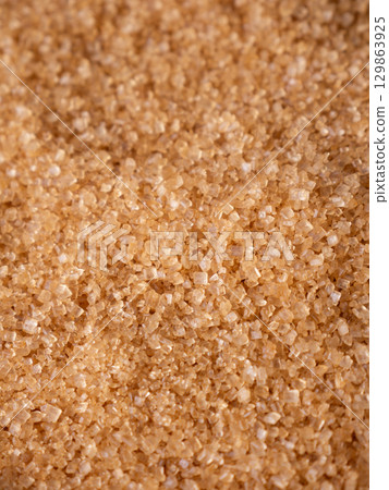 Organic Light Brown Sugar Background texture. 129863925