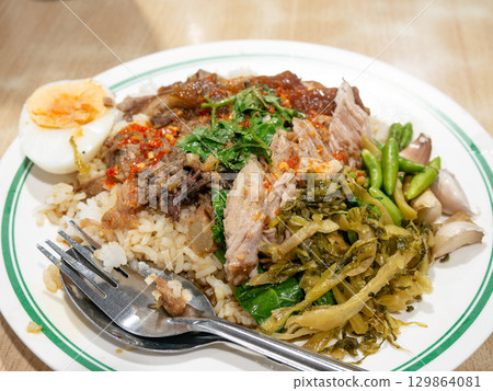 Khao Kha Moo - Thai Stewed Braised Pork Leg with Rice, Served on Plate Khao Kha Moo - Thai Stewed Braised Pork Leg with Rice, Served on Plate 129864081