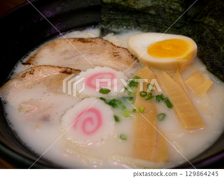 Traditional Japanese Tonkotsu Ramen with Chashu and Soft-Boiled Egg. Traditional Japanese Tonkotsu Ramen with Chashu and Soft-Boiled Egg. 129864245