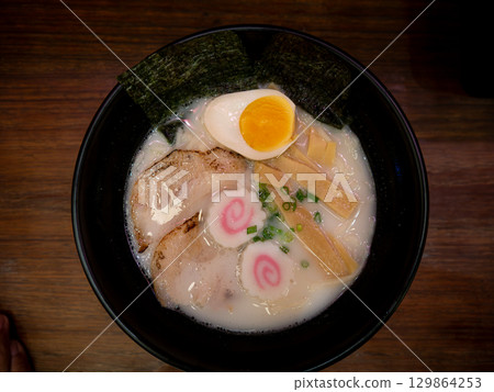 Traditional Japanese Tonkotsu Ramen with Chashu and Soft-Boiled Egg. Traditional Japanese Tonkotsu Ramen with Chashu and Soft-Boiled Egg. 129864253