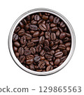 Roasted  Arabica coffee beans, in an opened tin can. Dark brown roasted seeds of berries from Coffea arabica, also known as Arabian, mountain or Arabica coffee. Close-up, isolated, from above. Photo 129865563