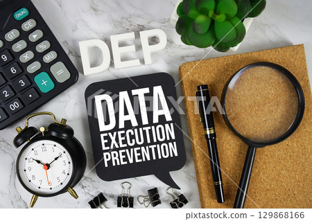 DEP Data Execution Prevention text with Calculator, alarm clock and magnifying glass on marble background 129868166