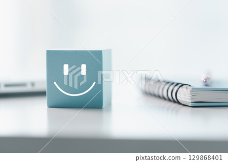 Client show feedback, smiley face sign. Service rating, satisfaction concept. happy smile face, good feedback rating, positive customer review, experience, satisfaction survey, smiley mental health. 129868401