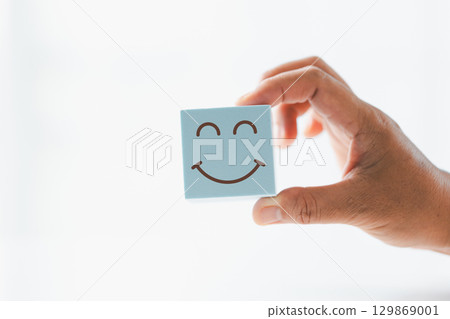 Client show feedback, smiley face sign. Service rating, satisfaction concept. happy smile face, good feedback rating, positive customer review, experience, satisfaction survey, smiley mental health. 129869001
