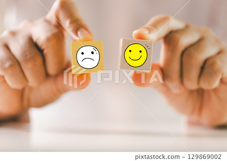 Customer showing rating with happy icon, Customer satisfaction survey concept, Positive feedback from happy client satisfaction with quality of service, marketing surveys, ratings, review, copy space 129869002