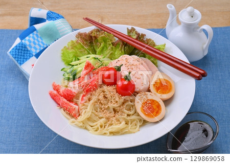 New summer ingredients for chilled Chinese noodles! Salad chicken, sunny lettuce, boiled egg, crab sticks, cherry tomatoes, and cucumber. New summer ingredients for chilled Chinese noodles! Salad chicken, sunny lettuce, boiled egg, crab sticks, cherry tomatoes, and cucumber. 129869058