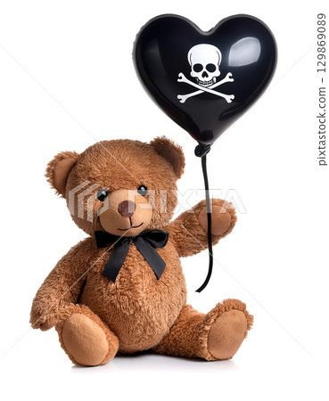 可愛的泰迪熊拿著一個帶有海盜旗的心形氣球。白色背景。 可愛的泰迪熊拿著一個帶有海盜旗的心形氣球。白色背景。 129869089