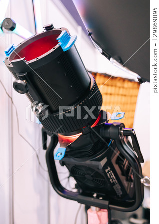 Professional studio LED spotlight close-up. Modern equipment for film, television and photo studios. Advertising shooting 129869095