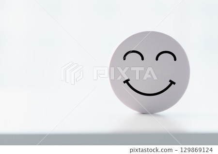 Client show feedback, smiley face sign. Service rating, satisfaction concept. happy smile face, good feedback rating, positive customer review, experience, satisfaction survey, smiley mental health. 129869124