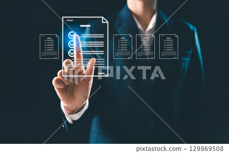 Business performance monitoring concept, Online survey and digital form checklist by laptop computer, Document management checking system, online documentation database and process manage files. 129869508