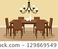 Dining area for a large company with a beautiful chandelier 129869549