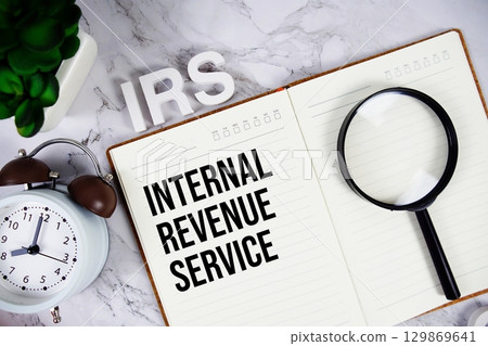 IRS Internal Revenue Service acronym on notepad, Business concept background IRS Internal Revenue Service acronym on notepad, Business concept background 129869641
