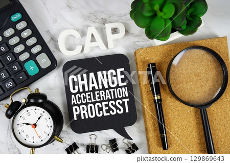 CAP Change Acceleration Process acronym with calculator, alarm clock and magnifying glass, business concept background CAP Change Acceleration Process acronym with calculator, alarm clock and magnifying glass, business concept background 129869643