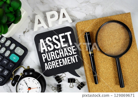 APA Asset Purchase Agreement acronym with calculator, alarm clock and magnifying glass, Business concept background APA Asset Purchase Agreement acronym with calculator, alarm clock and magnifying glass, Business concept background 129869671