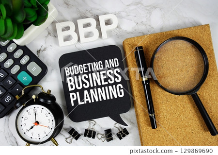 BBP Budgeting and Business Planning acronym with calculator, alarm clock and magnifying glass, business and marketing concept background 129869690