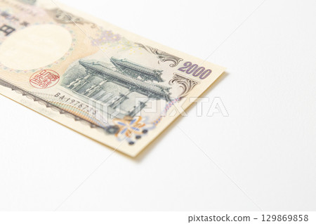 Two thousand yen bill on white background Two thousand yen bill on white background 129869858
