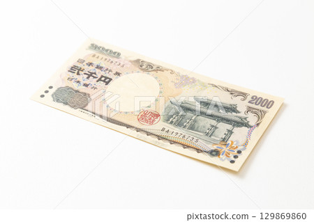 Two thousand yen bill on white background Two thousand yen bill on white background 129869860