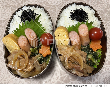 A traditional Korean dosirak, beautifully arranged with rice, assorted banchan, and savory proteins. Balanced and visually inviting, its a portable meal packed with vibrant flavors. 129870115