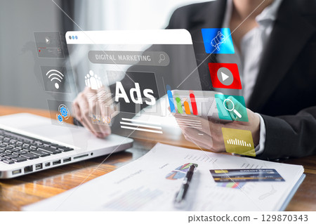 Concept of digital marketing involves using online advertising, product ads, social media promotion to boost sales of products and services through various digital tools and internet platforms. ad 129870343