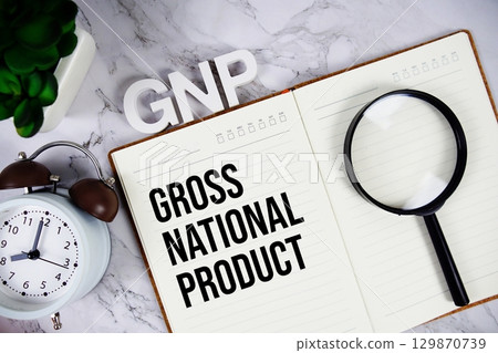GNP Gross National Product acronym on notepad, Business concept background 129870739