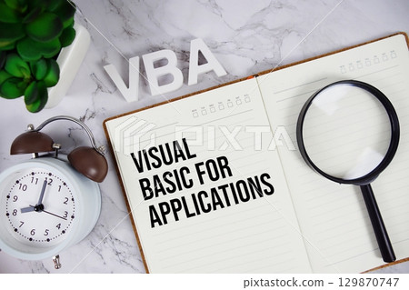 VBA Visual Basic for Applications acronym on notepad, Financial concept background VBA Visual Basic for Applications acronym on notepad, Financial concept background 129870747