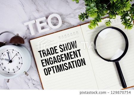 TEO Trade Show Engagement Optimisation acronym on notepad, Business concept background TEO Trade Show Engagement Optimisation acronym on notepad, Business concept background 129870754