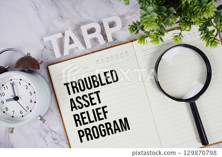 TARP Troubled Asset Relief Program acronym on notepad, Business concept background TARP Troubled Asset Relief Program acronym on notepad, Business concept background 129870798