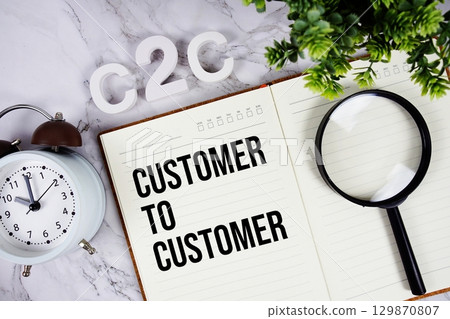 C2C Customer to Customer acronym on notepad, Business concept background 129870807