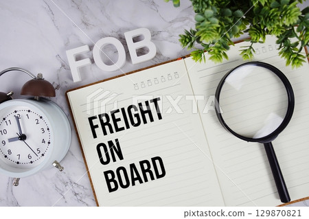 FOB Freight on Board acronym on notepad, Business concept background 129870821
