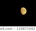 Half moon in the night sky 129871042