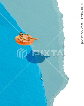 Minimalist pop art collage. Boy floating in orange tube above torn blue paper water 129871048