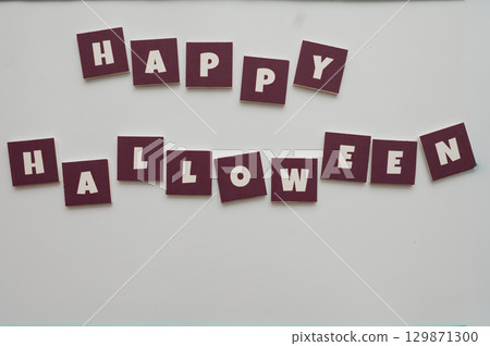 Halloween design with purple background and text 129871300