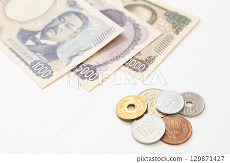 Japanese money on white background 129871427